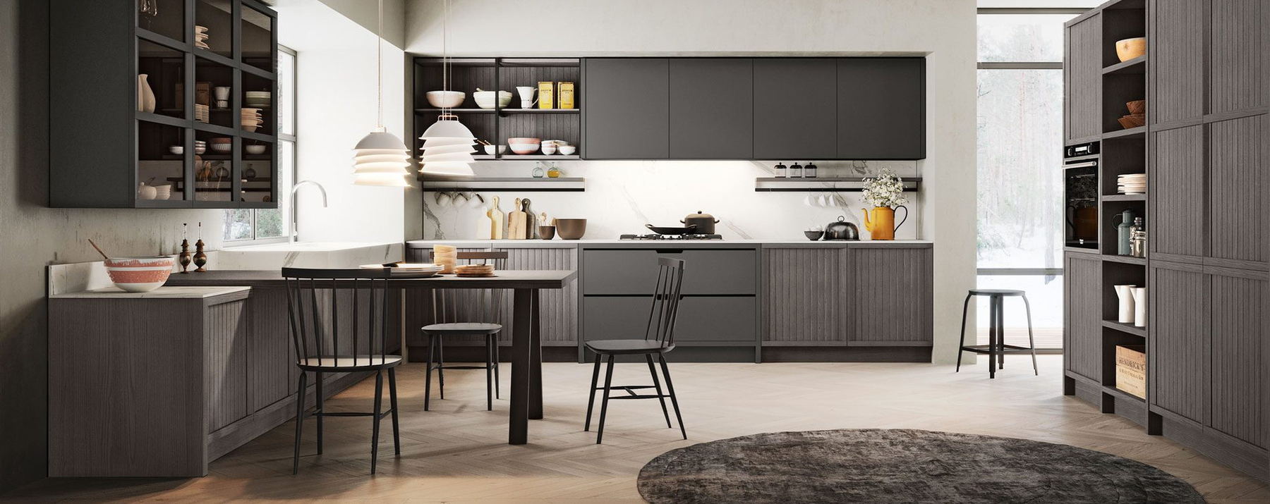 Charcoal classic kitchen with herringbone floor and a dining table