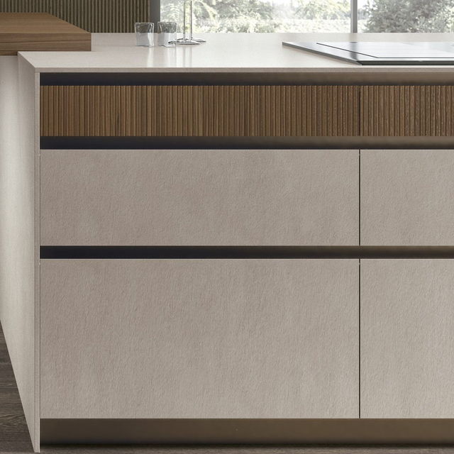 Fluted oak band above a stone-effect drawer front