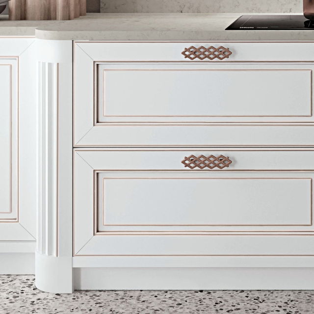 Bevelled inset doors with rose-gold trim