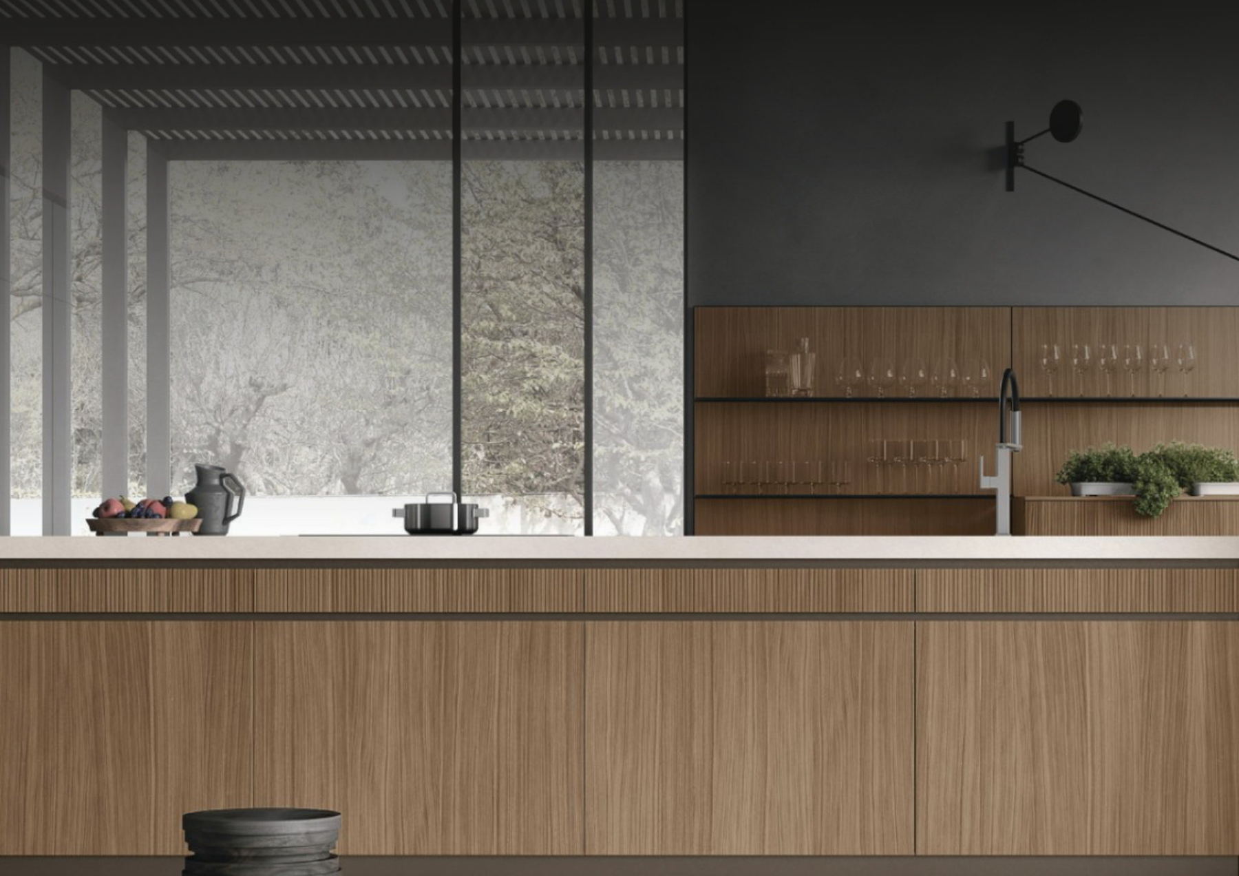 Fluted oak island with a dark plaster wall and full-height glazing